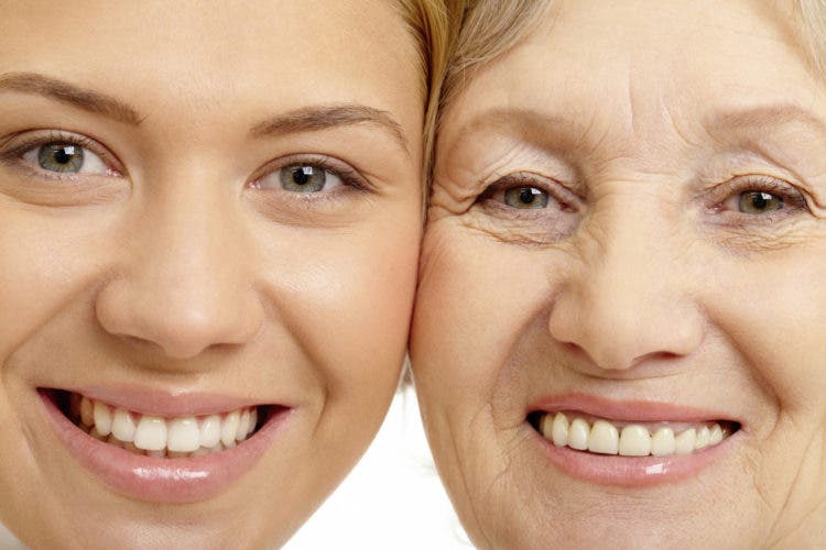 Close-up of two faces of beautiful woman and mother