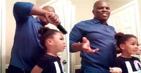 La reacción de una niña de 3 años al ver el peinado que le hizo su padre