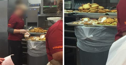 Captan a la empleada de un conocido restaurante haciendo una hamburguesa sobre un cubo de basura