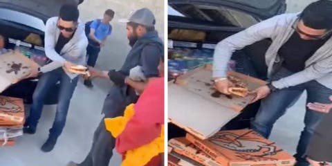 Graban a un joven que detuvo su coche y empezó a sacar cajas de pizza y refrescos del maletero