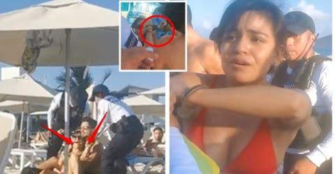 Graban cómo se llevan detenida a una pareja en la playa «porque solo tomaban sol»