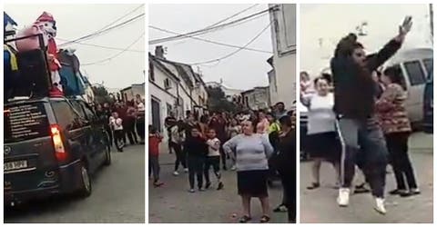 Un barrio se salta el confinamiento y monta una fiesta masiva con música y «carroza» en la calle