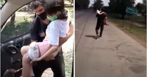 Caminan 5 km con su hija enferma de cáncer cargada por la falta de compasión de la policía