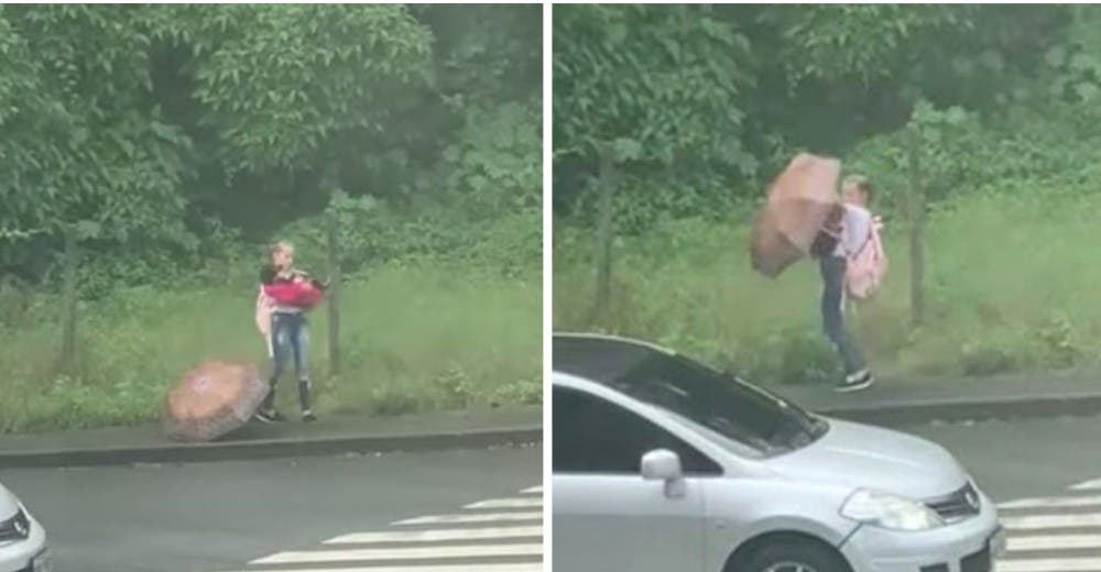 Una niña se enfrenta a la intensa lluvia para salvar a un perrito abandonado